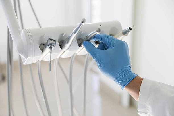 Professional Tooth Extraction technician working in Haw River, NC